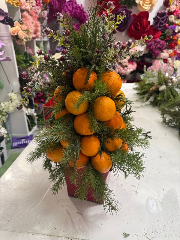 Holiday arrangement with oranges