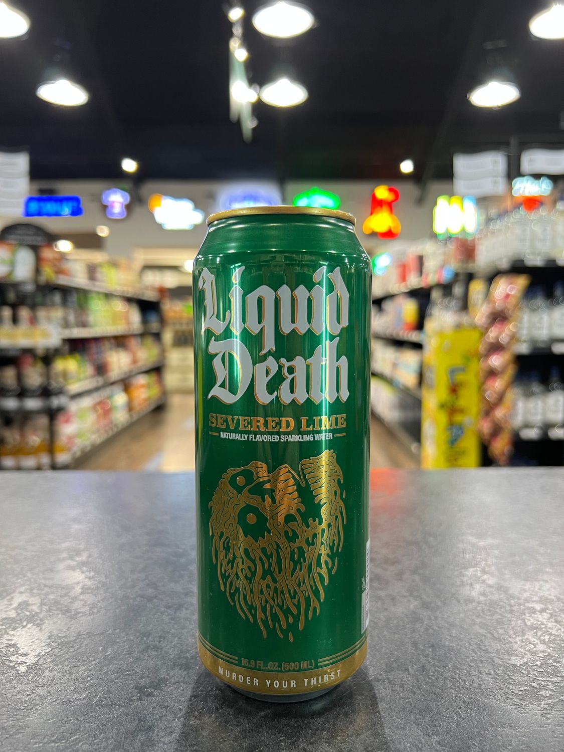 LIQUID DEATH SEVERED LIME SPARKLING WATER, 16.9OZ