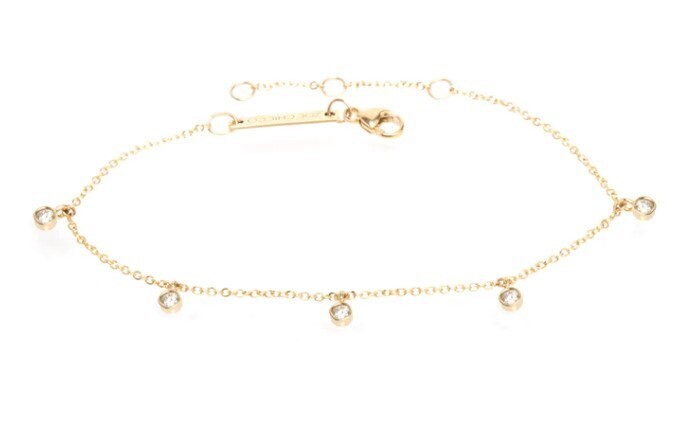 Bracelet- 14k bracelet with 5 dangling 1.5mm bezel set..round white diamonds (.08 ctw)..