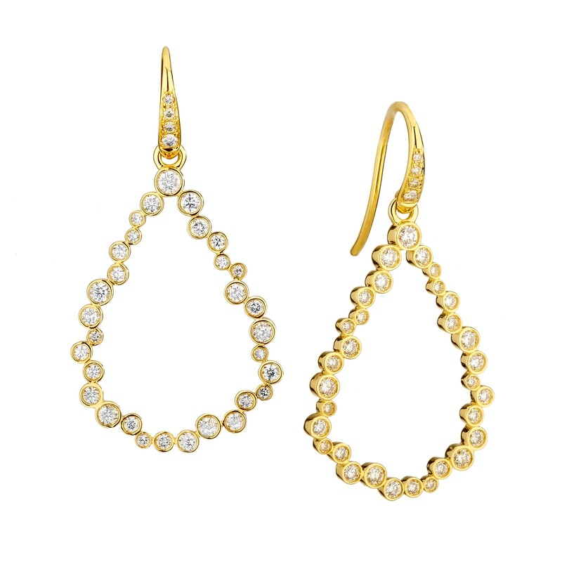 18k Cosmic tear drop earrings w. diamonds .85 cts