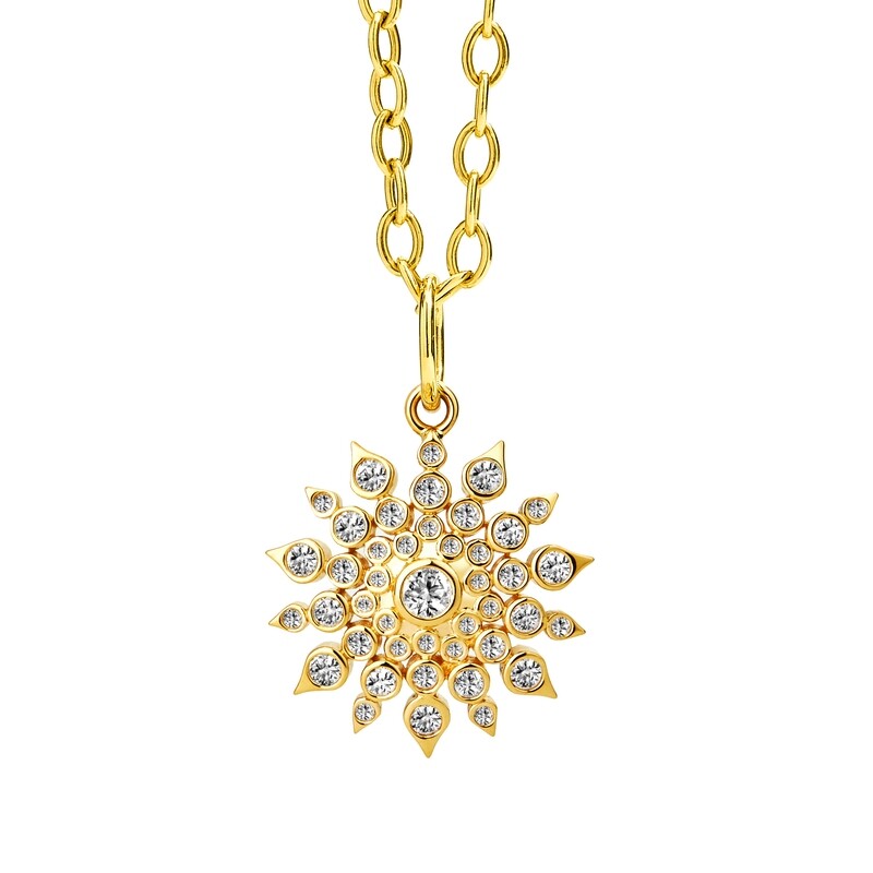 18k Cosmic starburst pendant w. diamonds 0.60ct