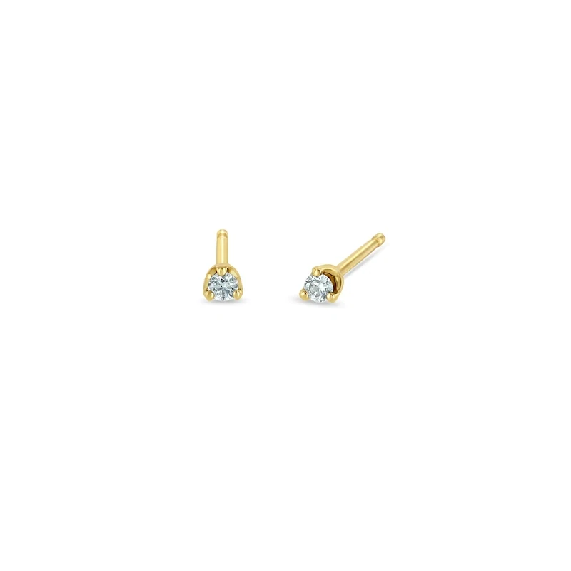 Earrings- 14k 2mm wt diamond prong Studs .06ctw