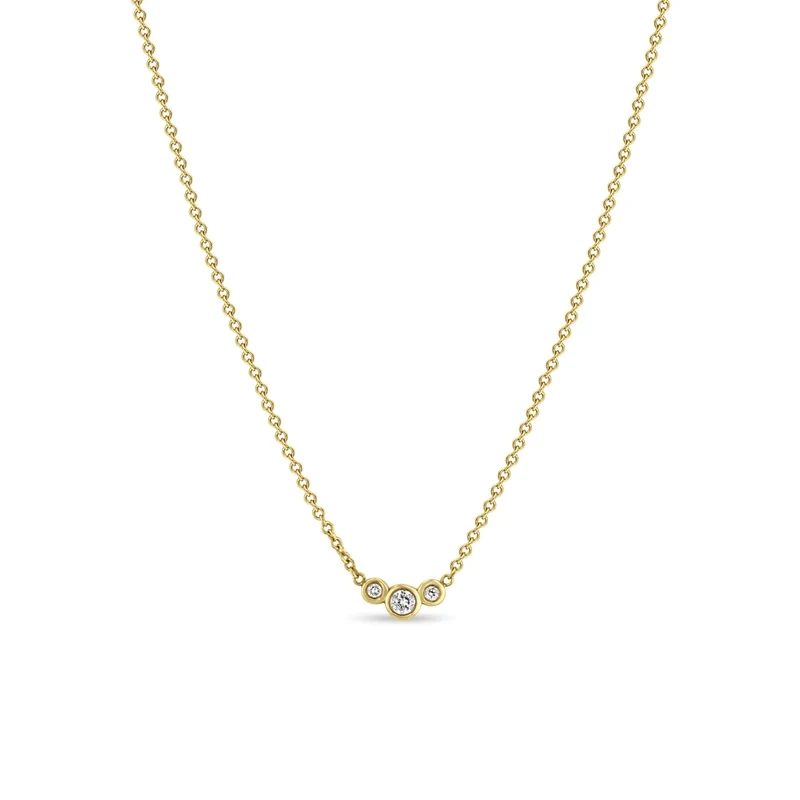 Necklace- 14k small 3 graduated curved diamond bezel..necklace (.05 ctw)