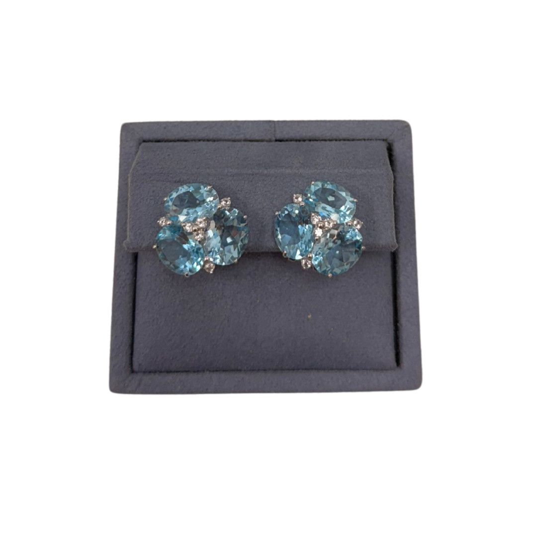 3 Oval Blue Topaz/ Wht Rounds, Rhod