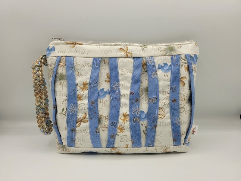 Trousse con fantasia di tessuti colori pastello