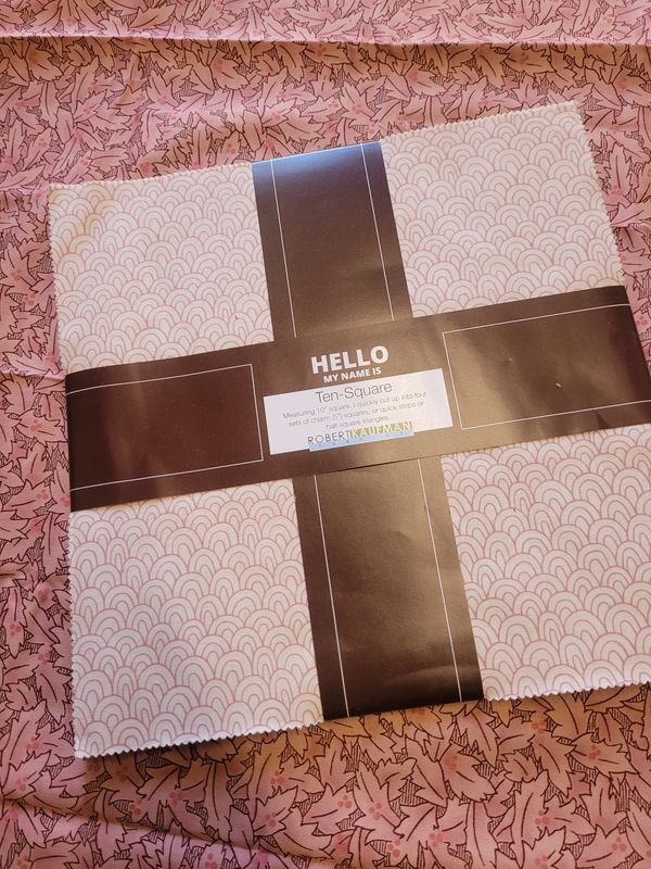 Layer cake Hello my name is by Robert Kaufman Layer cake Hello my name is by Robert Kaufman