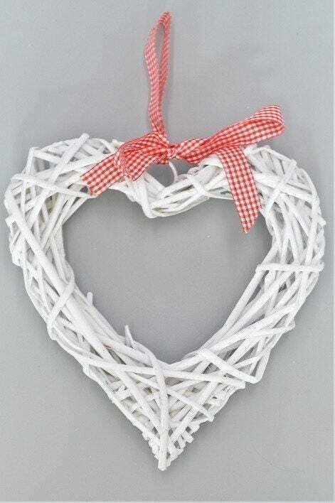 This Large White Heart Scandi style willow hanging star decoration is the perfect addition to your festive display