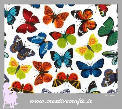 Cotton fabric with multicolored butterflies on a White