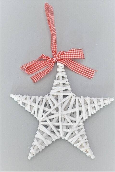 This White Scandi style willow hanging star decoration is the perfect addition to your festive display