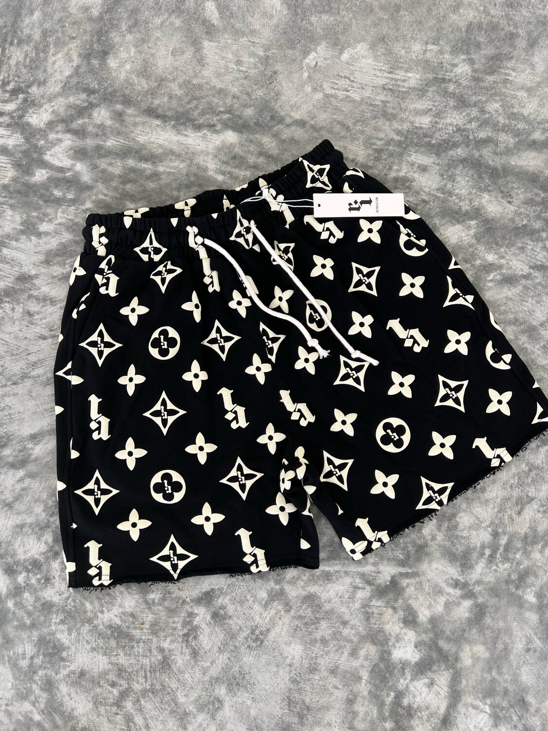 BLACK “RI” PUFF PRINT SHORTS
