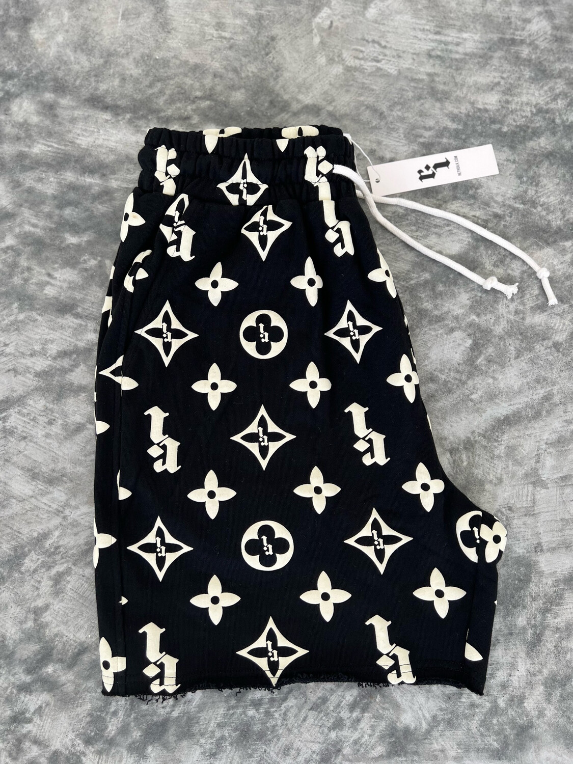 BLACK “RI” PUFF PRINT SHORTS