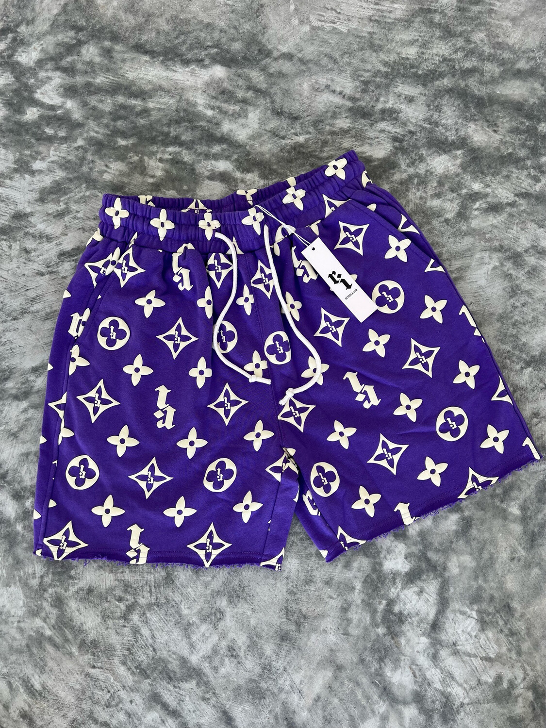 PURPLE “RI” PUFF PRINT SHORTS