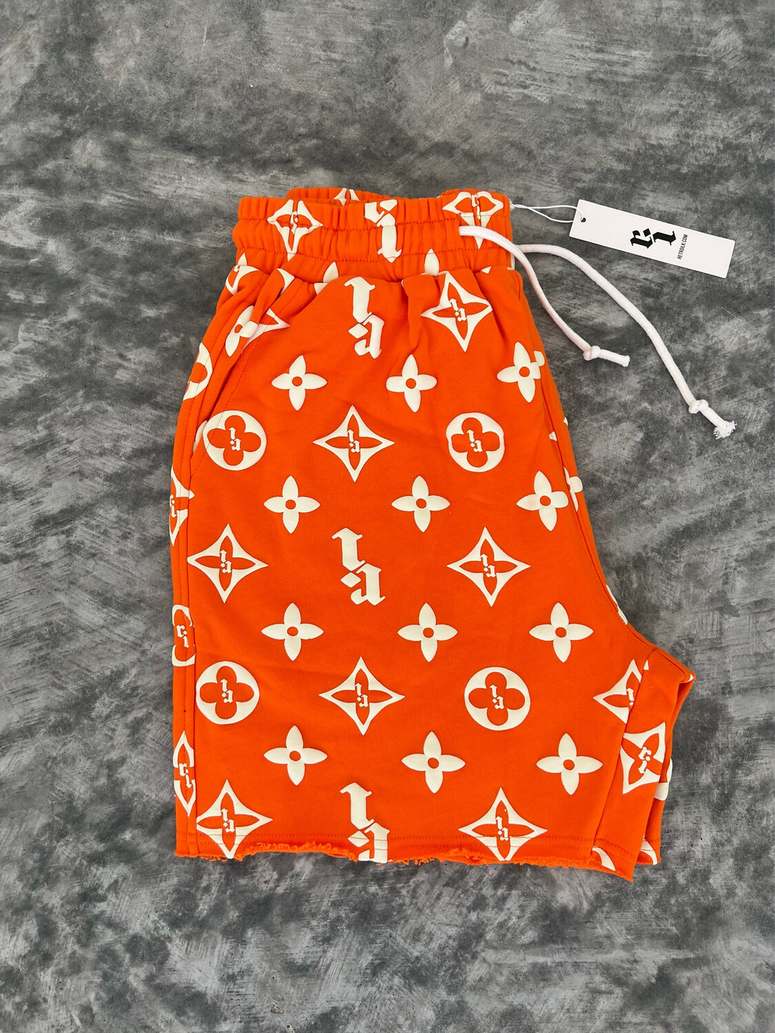ORANGE “RI” PUFF PRINT SHORTS