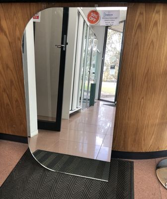 Frameless shaped mirror