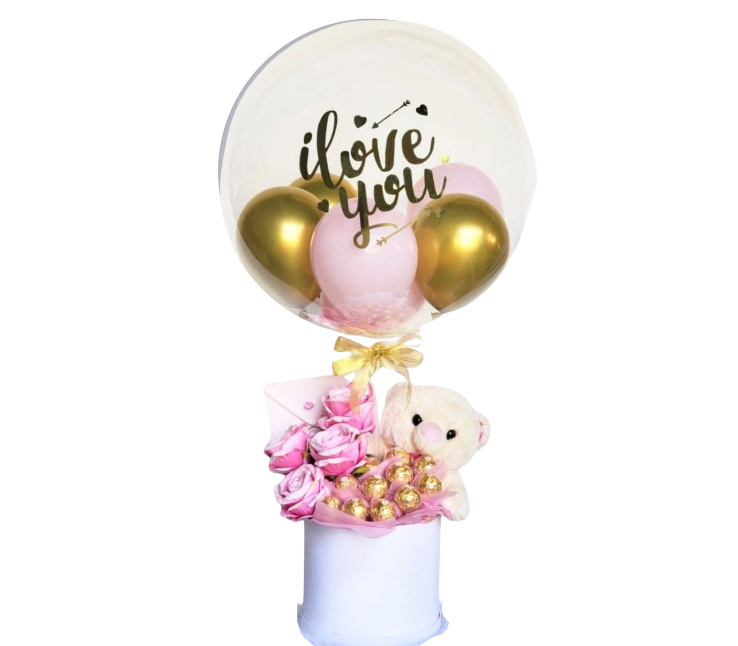 Pink Roses, Chocolates, Teddy Bear and 1 large clear balloon with writing on it.