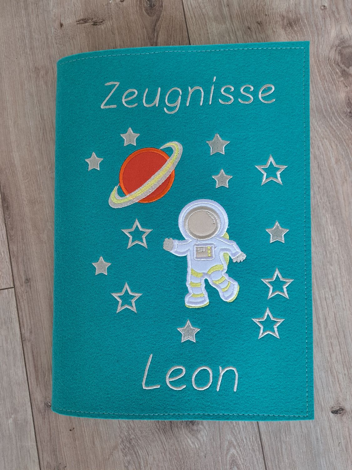 Zeugnismappe Astronaut helles Petrol