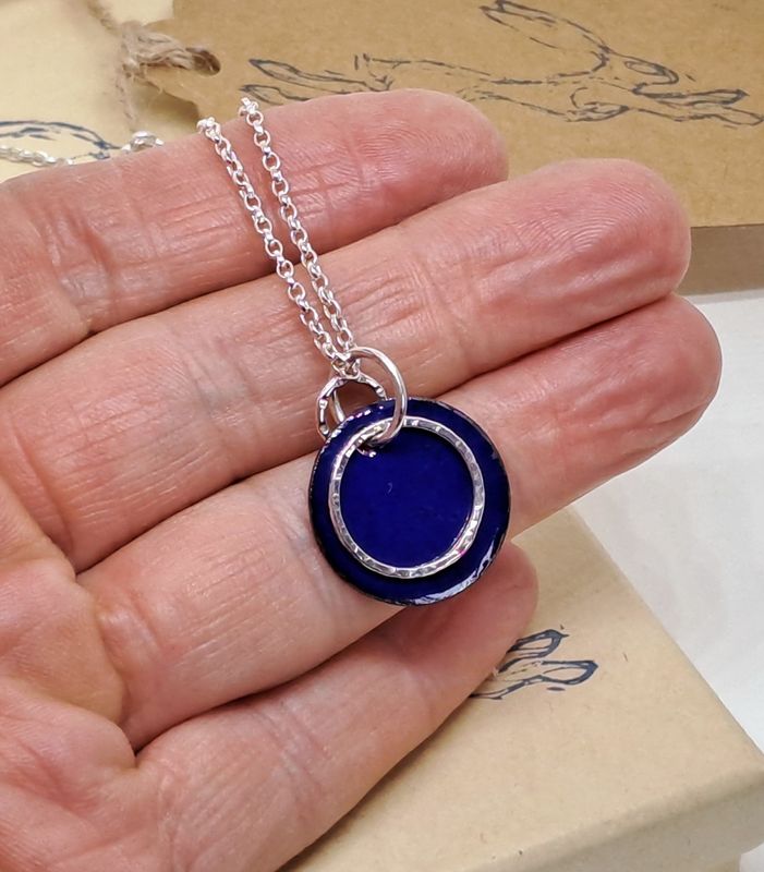 ENAMEL AND SILVER CIRCLES