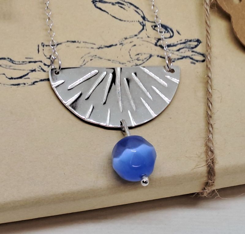 FAN PENDANT WITH BEAD