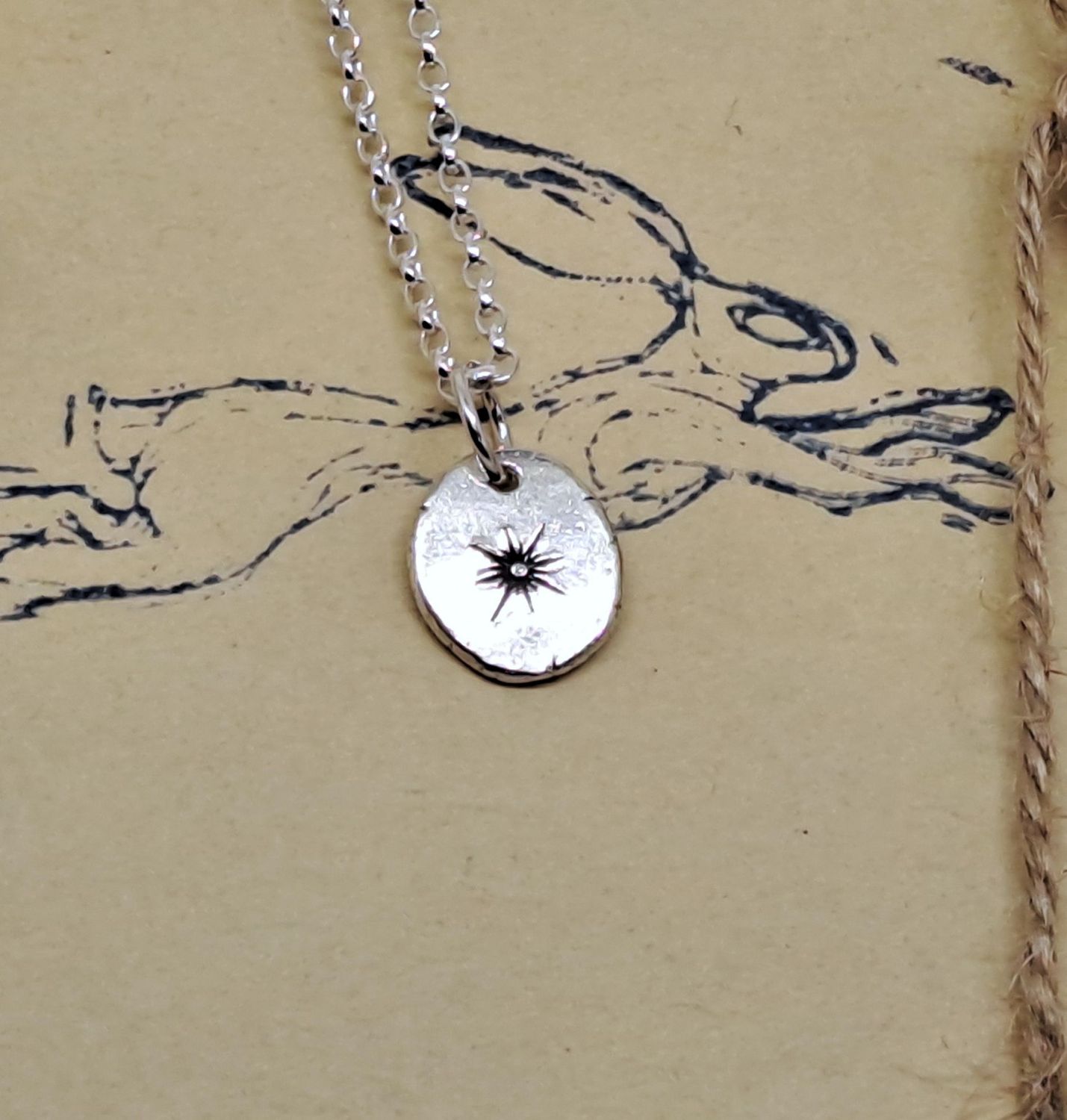 CHARM PENDANT WITH SIRIUS STAR