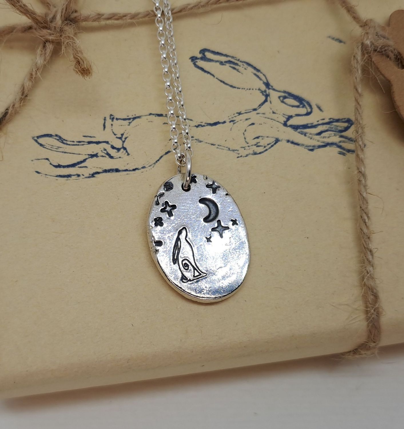 HARE GAZING PENDANT