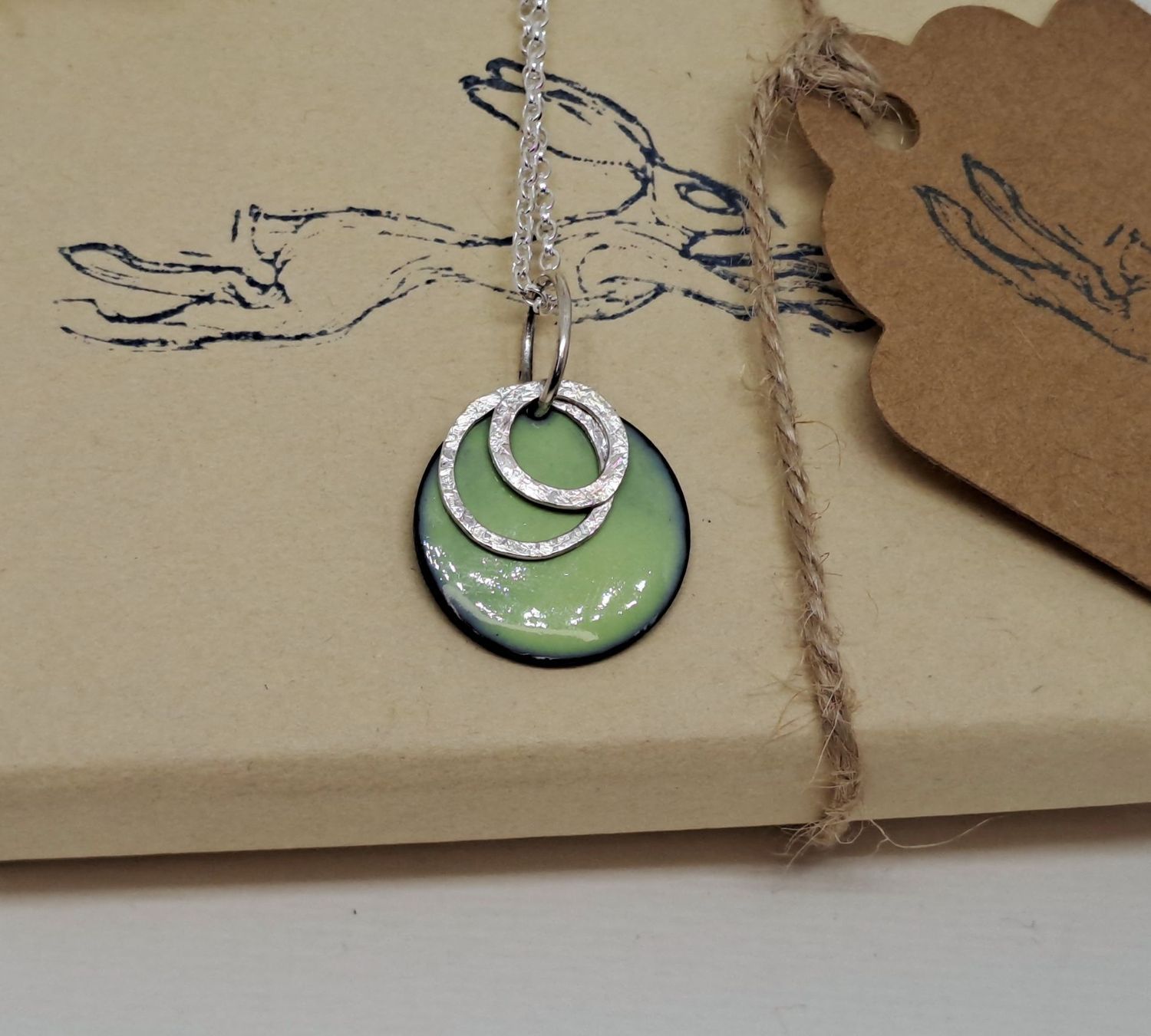 ENAMEL AND SILVER CIRCLES