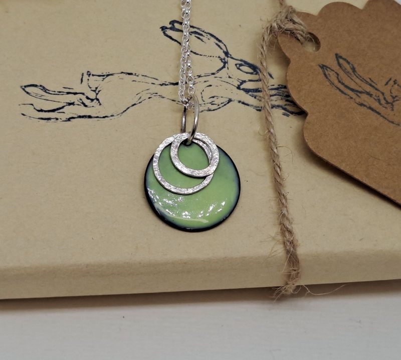 ENAMEL AND SILVER CIRCLES