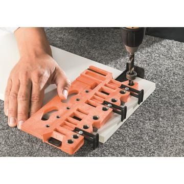 Universal drilling template for front fixing brackets etc