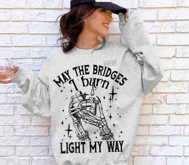MAY THE BRIDGES I BURN LIGHT MY WAY
