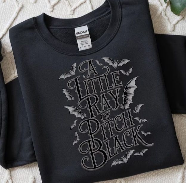 A LITTLE RAY OF PITCH BLACK