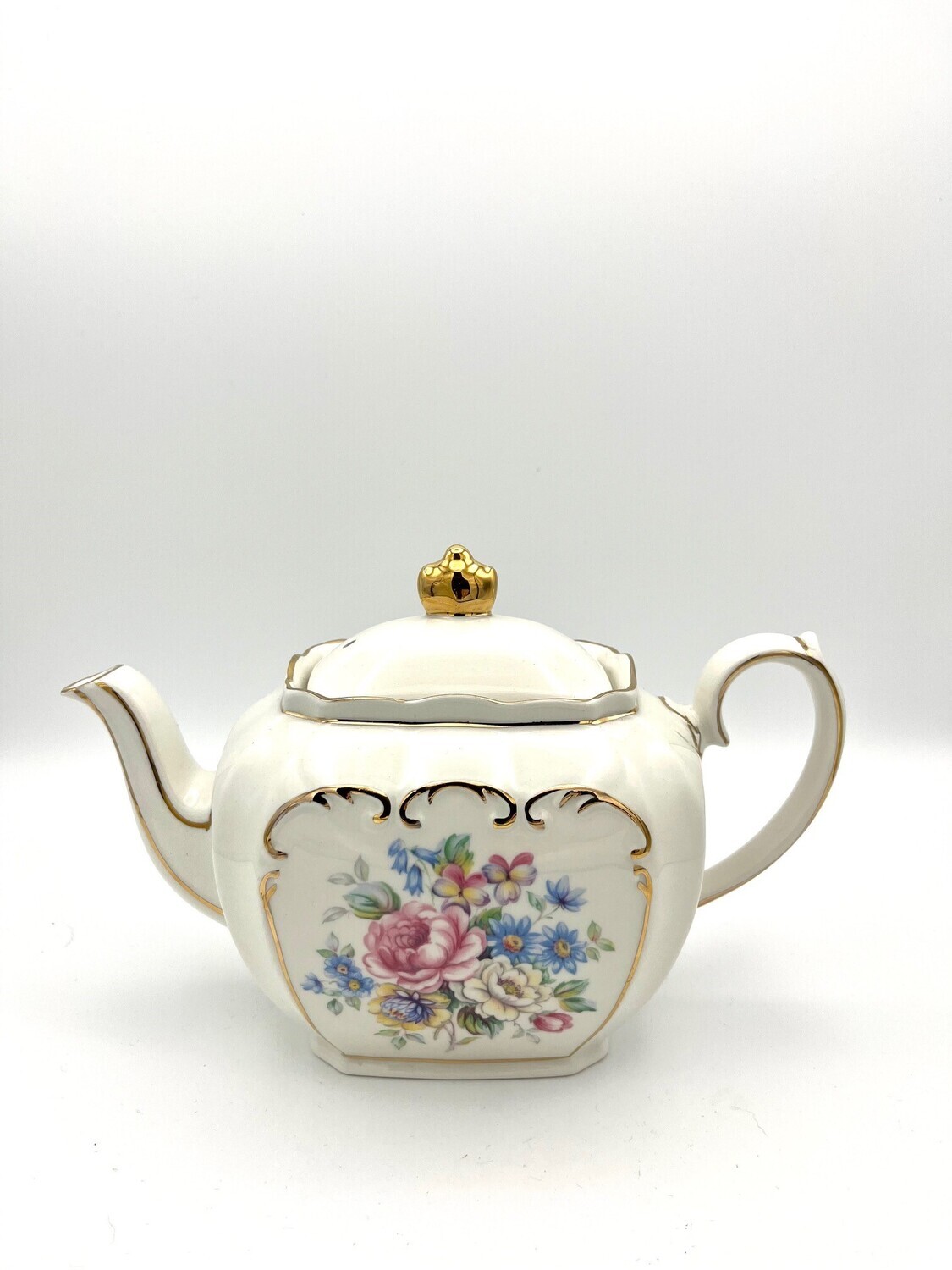 Teekanne mit Rosendekor