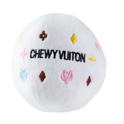 White chewy Vuitton ball dog toy