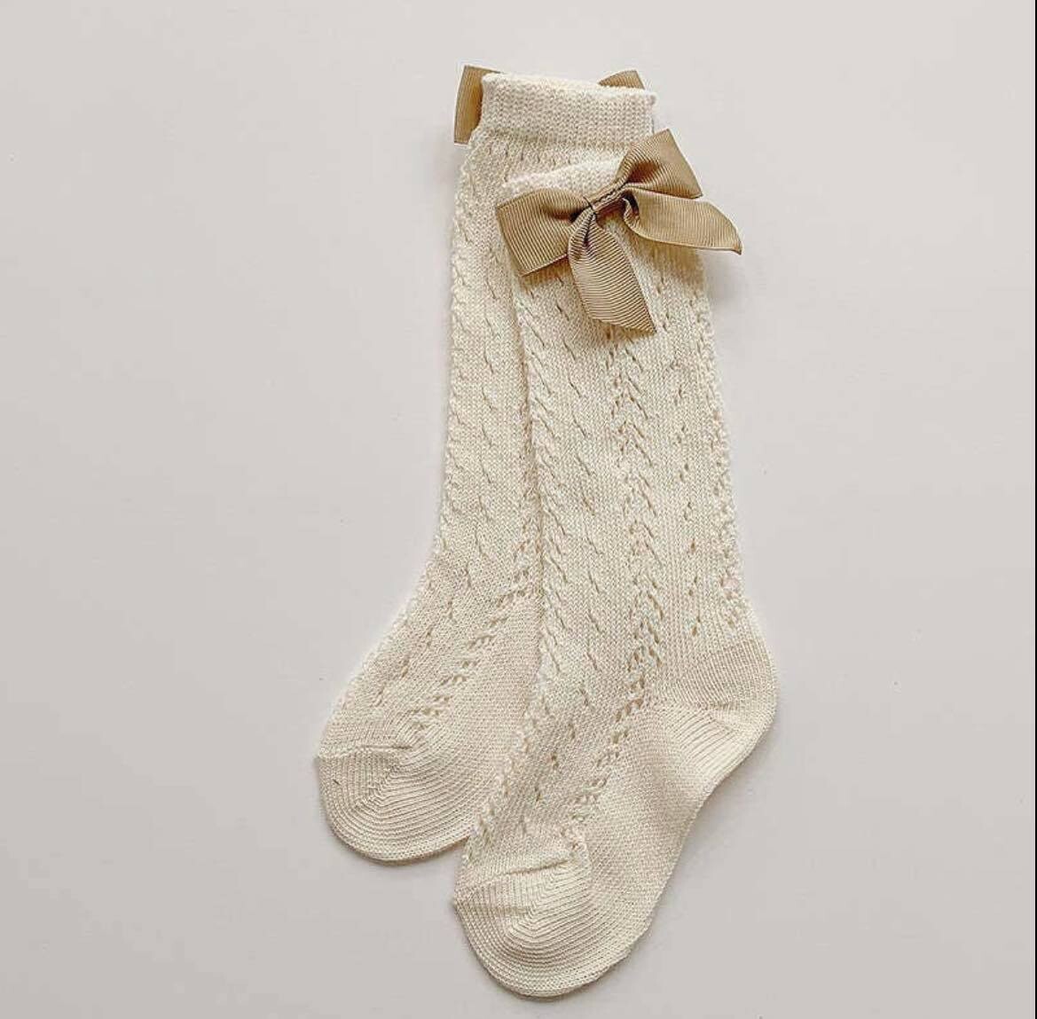 Beige met strik
