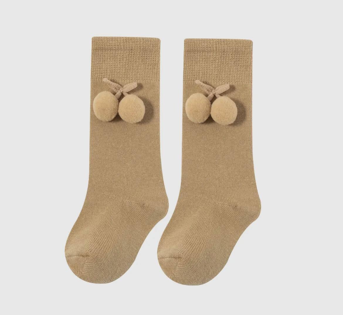 Beige lange kousen met bolletjes