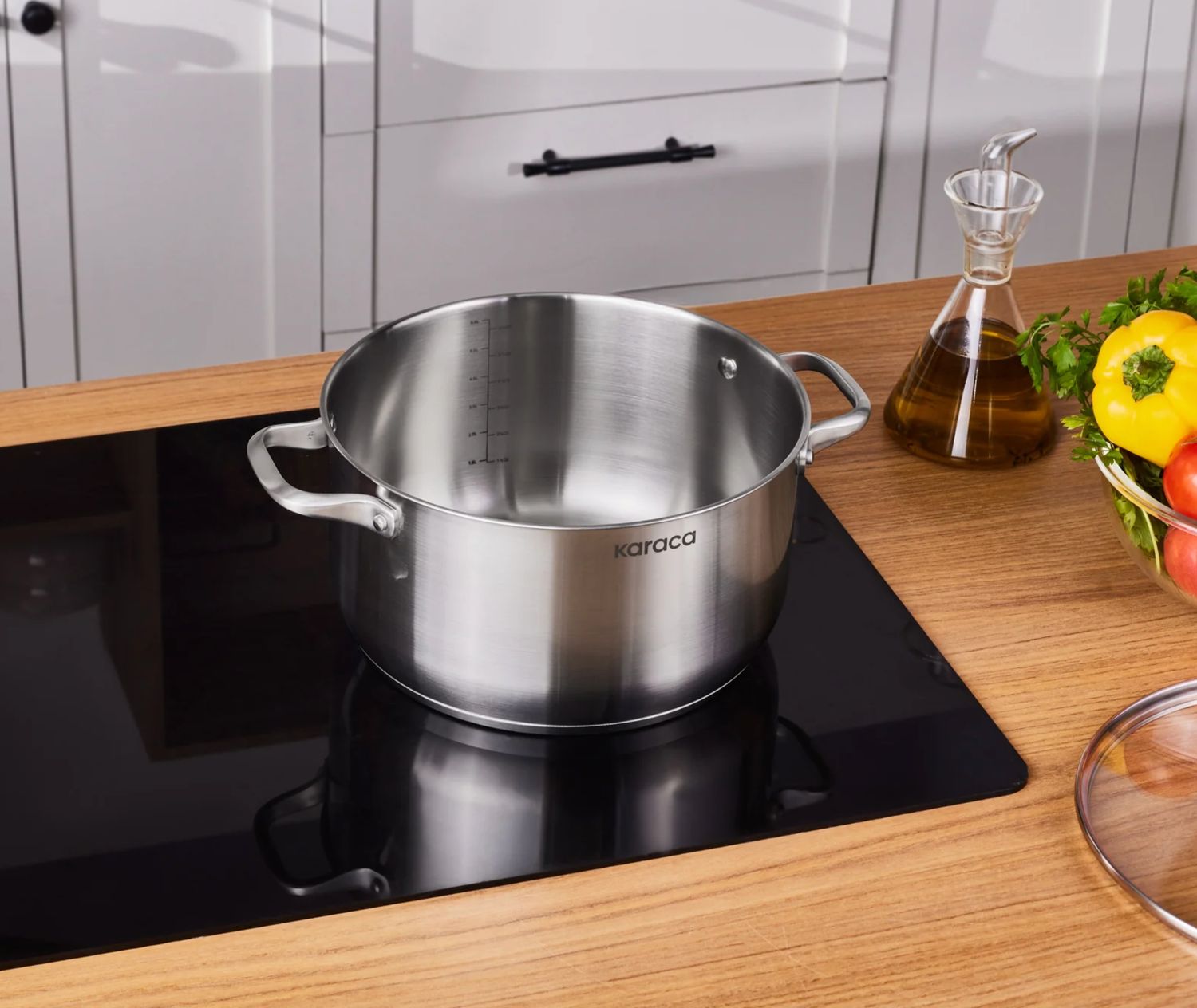 Karaca Elite roestvrijstalen inductie kookpot met deksel, 30 cm, zilver