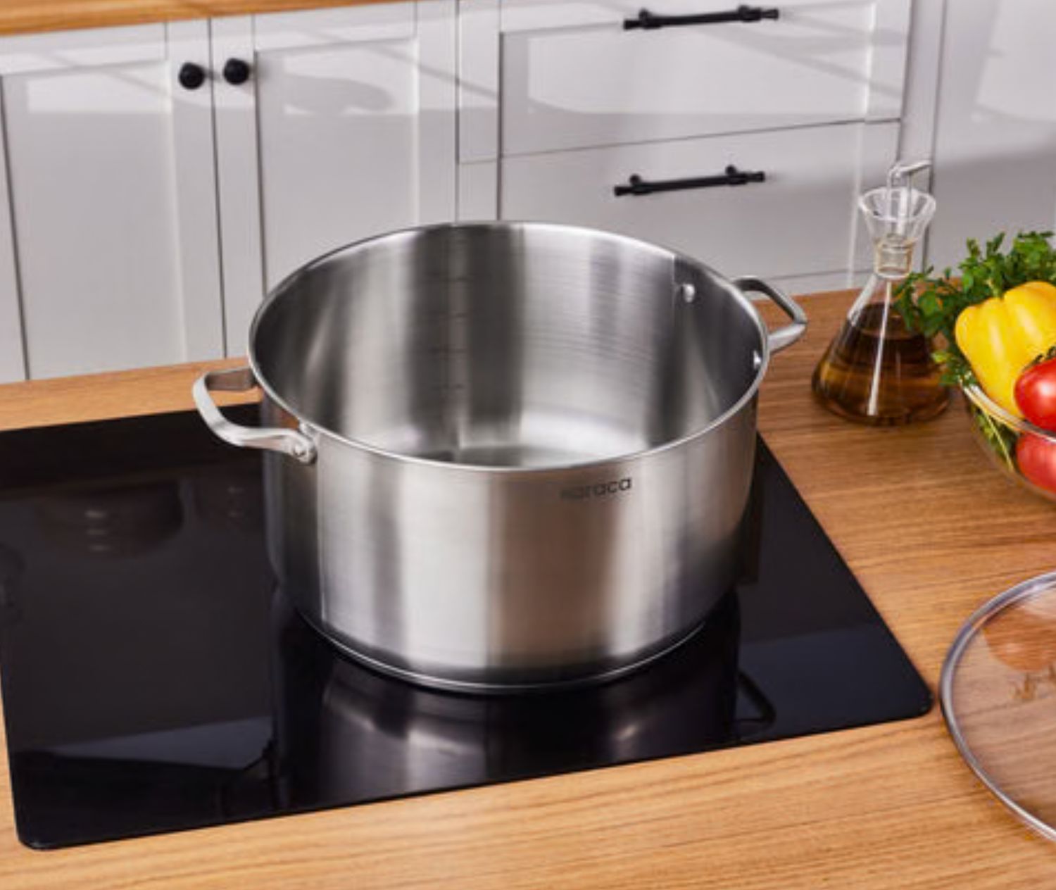 Karaca Elite roestvrijstalen inductie kookpot met deksel, 34 cm, zilver Karaca Elite roestvrijstalen inductie kookpot met deksel, 34 cm, zilver