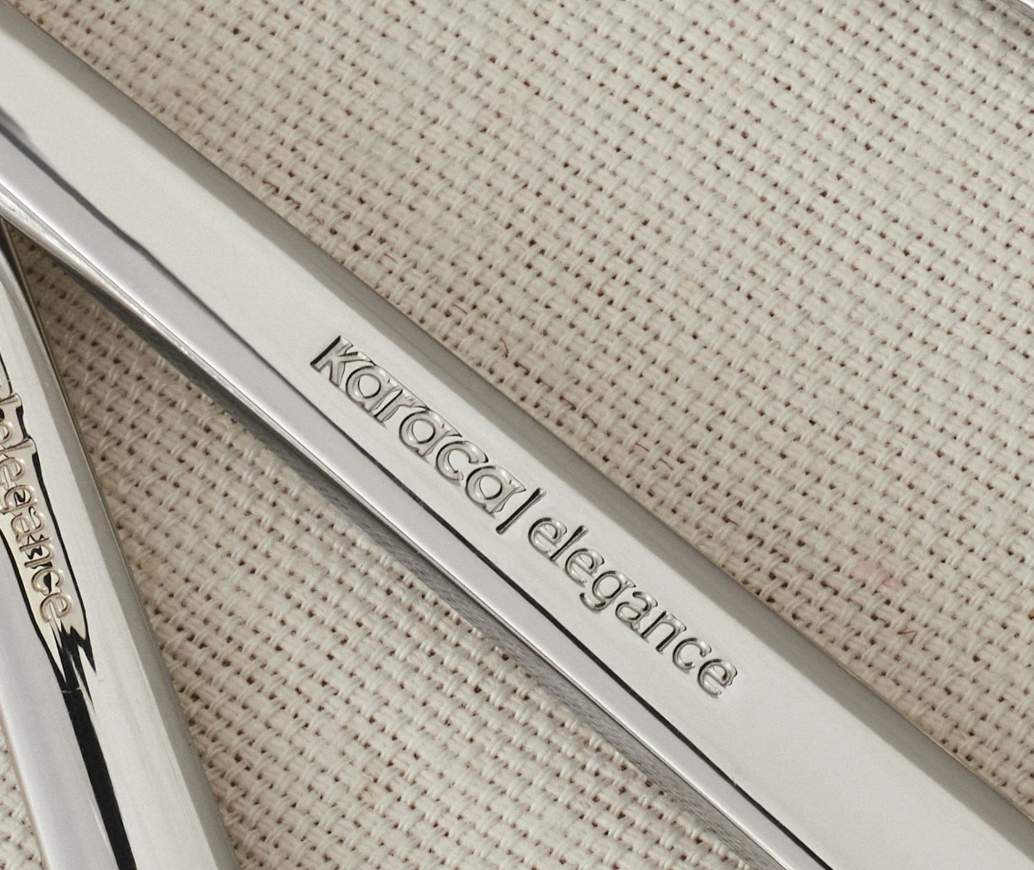 Karaca Halley 91-delige roestvrijstalen bestekset met serveerset voor 12 personen, zilver