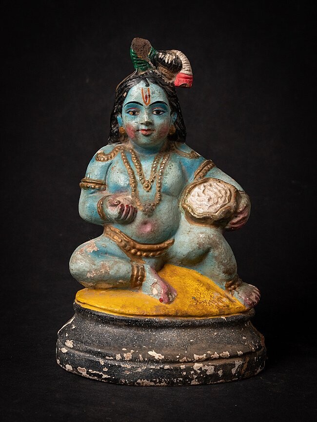 Antiek aardewerk beeld van Krishna als kind