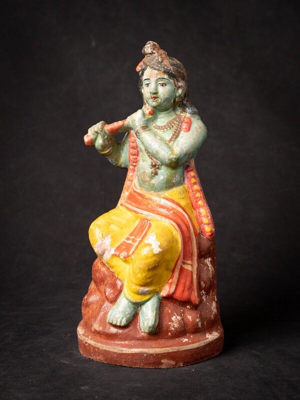 Antiek Krishna beeld