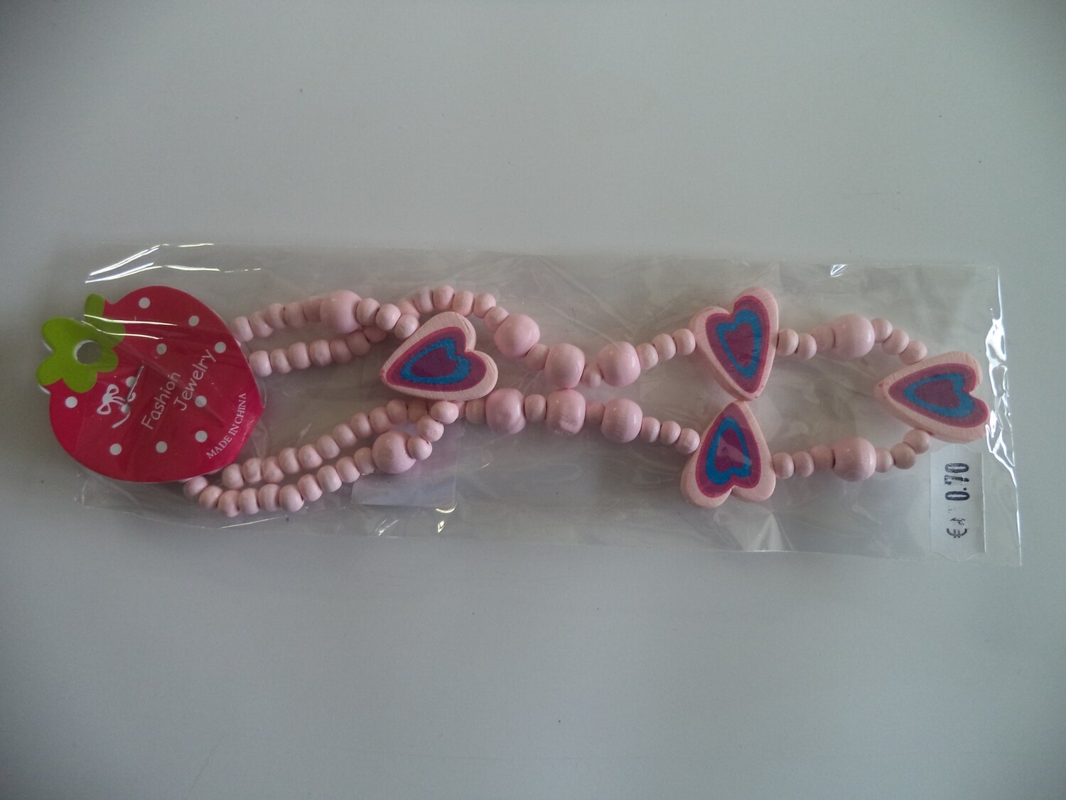 Houten ketting en armband roze hartjes