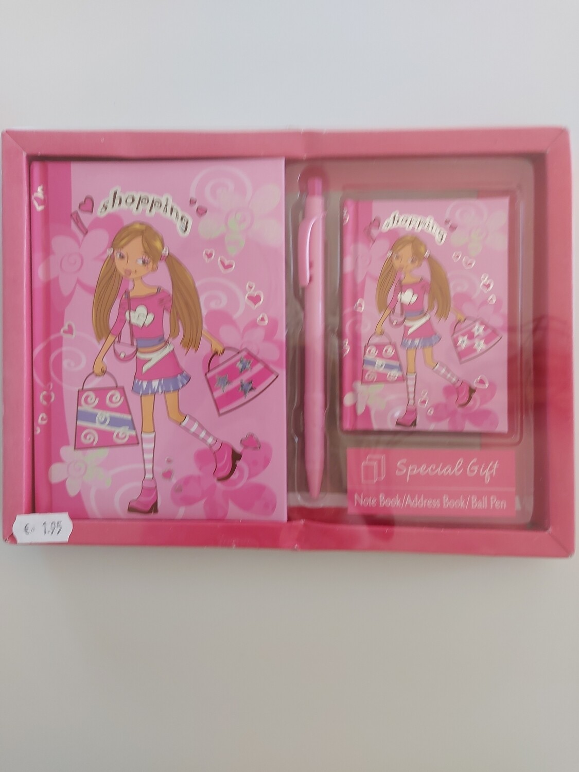 Schrift, adresboek en pen rose