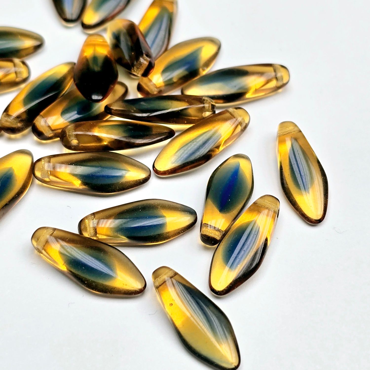 Daggers 5x16mm: Transparent Amber Sapphire