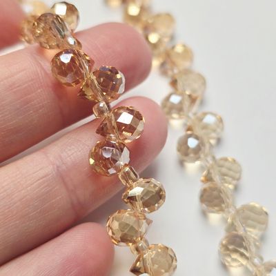 8x6mm Faceted Teardrop Crystals: Gold Champagne