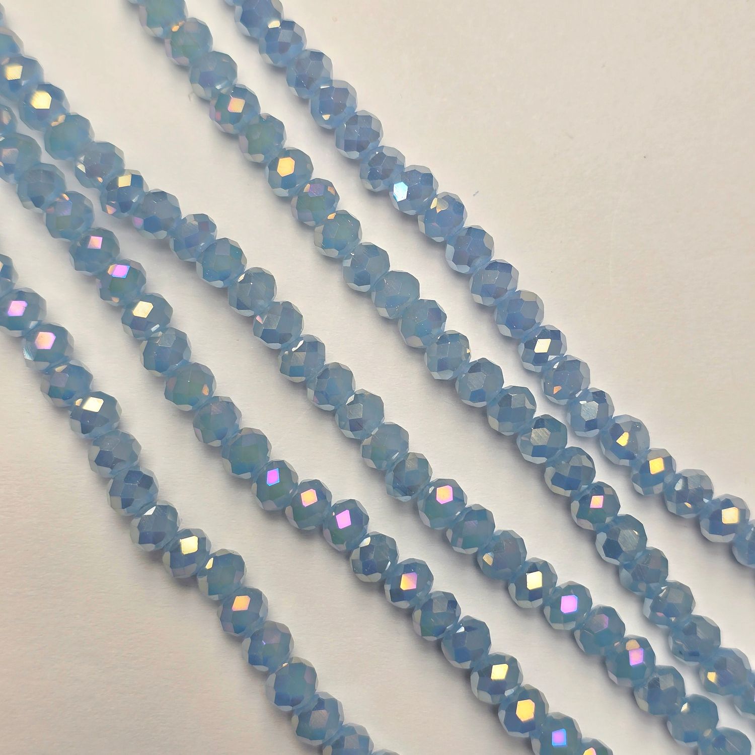 6mm Rondelle: Opal Light Sapphire AB Crystal Strand 6mm Rondelle: Opal Light Sapphire AB Crystal Strand