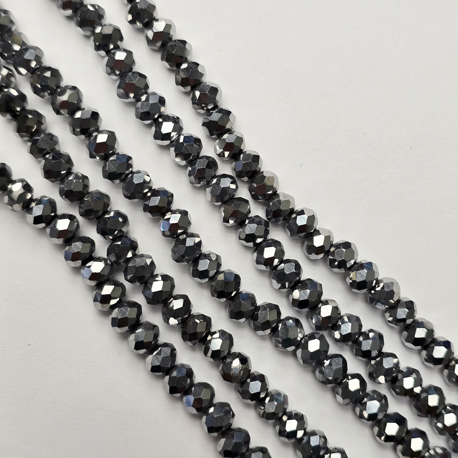 6mm Rondelle: Silver Crystal Strand 6mm Rondelle: Silver Crystal Strand