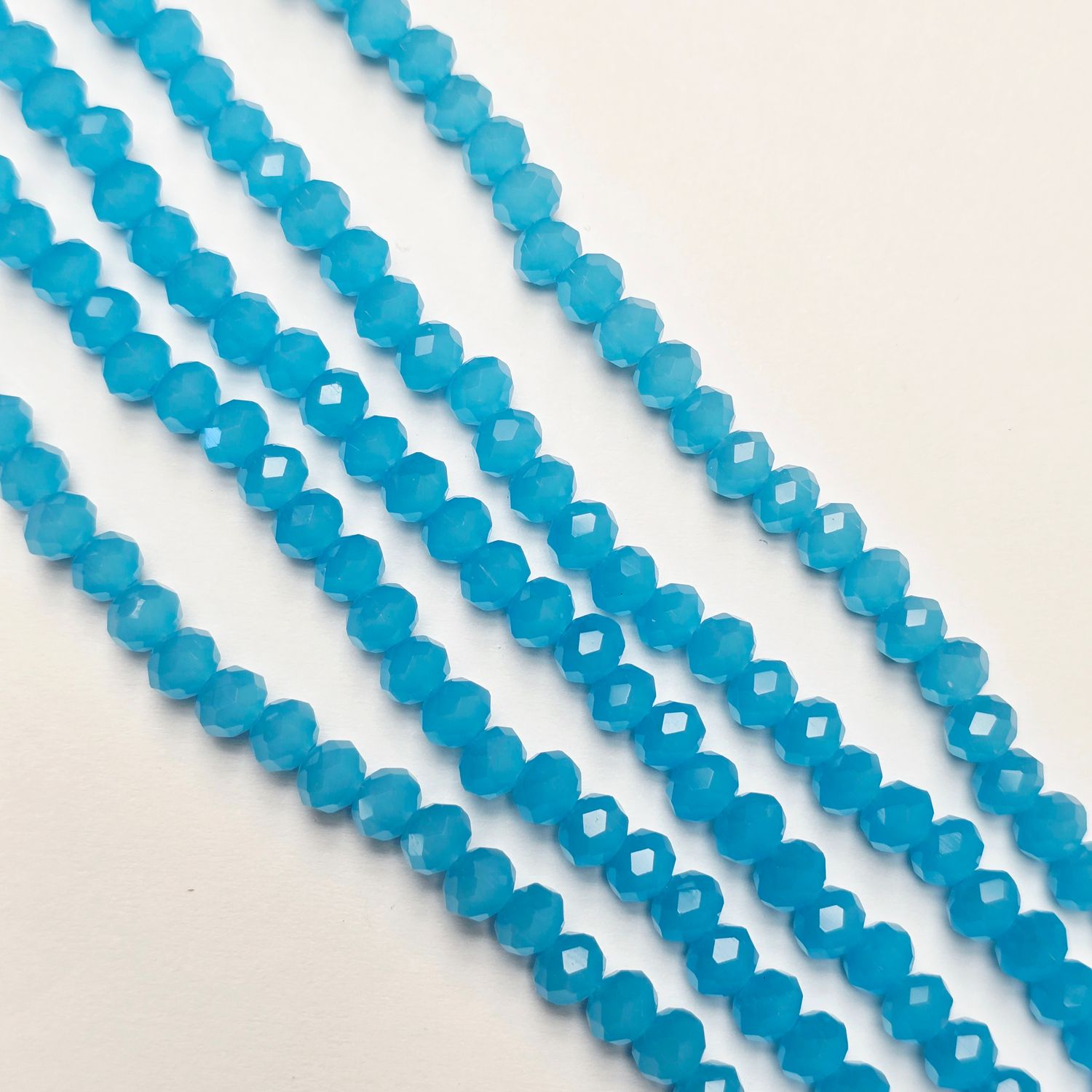 6mm Rondelle: Opal Light Blue Crystal Strand 6mm Rondelle: Opal Light Blue Crystal Strand
