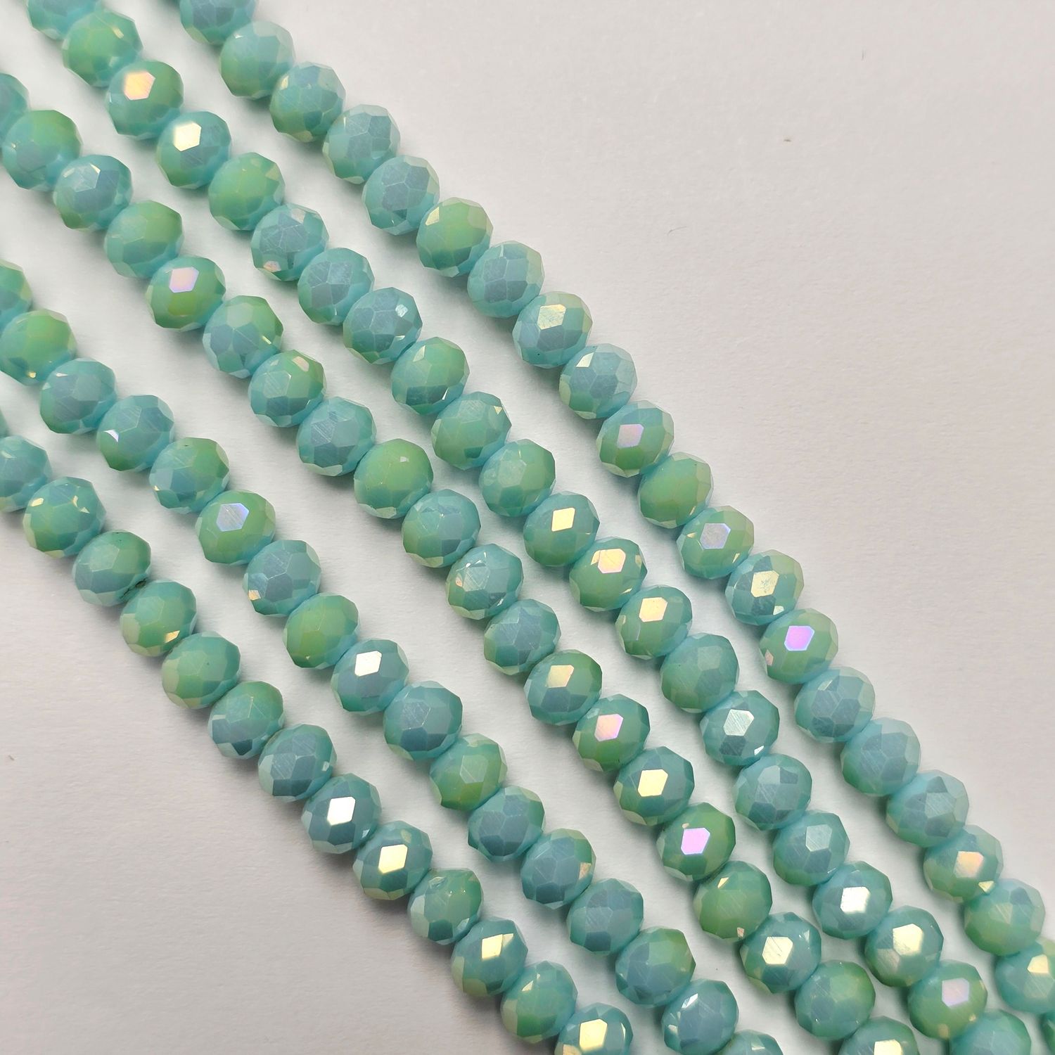 6mm Rondelle: Seafoam Blue Gold Luster Crystal Strand 6mm Rondelle: Seafoam Blue Gold Luster Crystal Strand