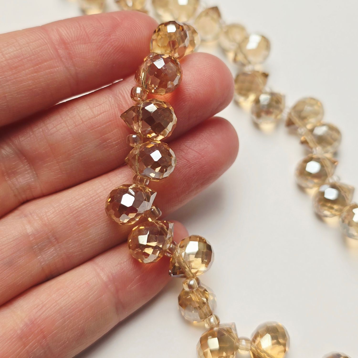 10x8mm Faceted Teardrop Crystals: Gold Champagne