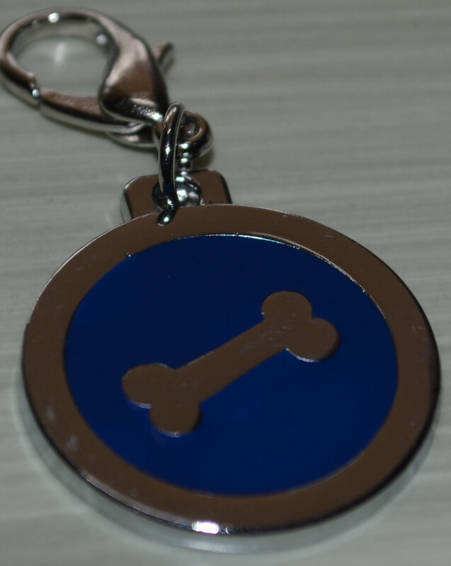 Tag Blue with Silver Bone Shape on circle shape