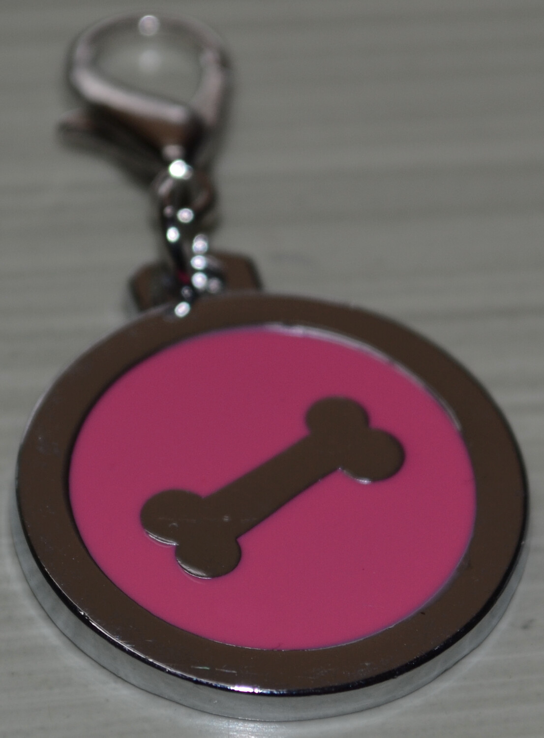 Tag Pink with Silver Bone Shape on circle shape