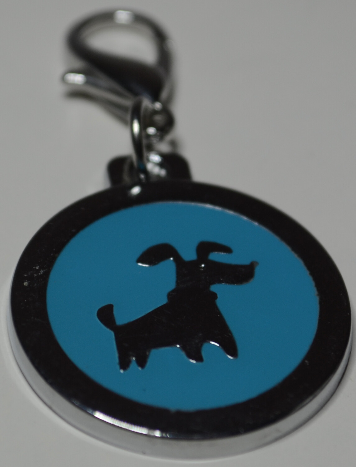 Tag Blue with Silver Dog Shape on circle shape
